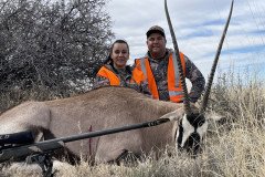 Guided New Mexico oryx hunt with trophy bull in open desert terrain